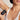 aluminum free deodorant being applied to underarm