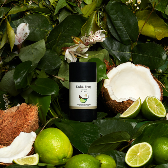 product surrounded by coconut and limes