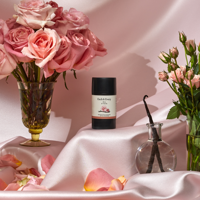 product surrounded by rose and vanilla