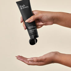 hand squeezing Pristine Clean Gentle Facial Cleanser from tube into hand small image